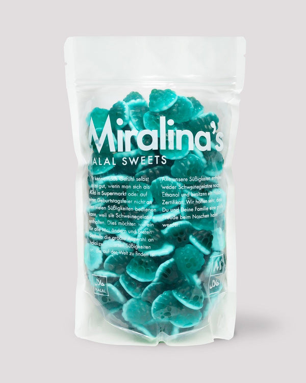 Eine Packung Miralina's Halal Sweets gefüllt mit türkisfarbenen, geformten Fruchtgummis